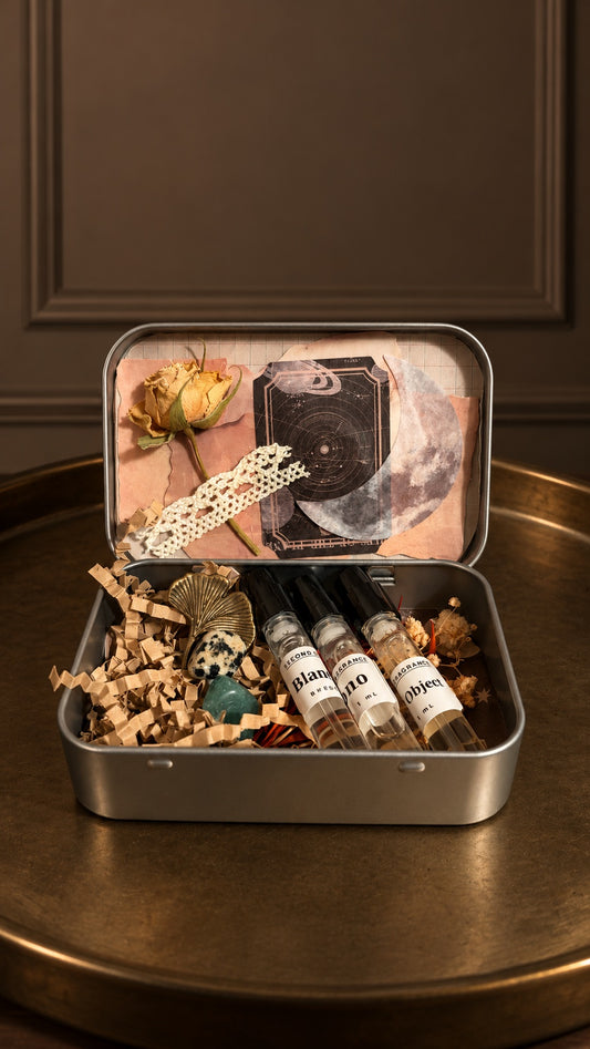 The Second Note Scent Surprise Tin - an actual tin made by Second Note, with three 1 mL decants, dried flowers, stones and themed extras